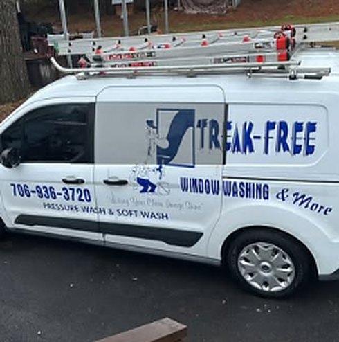 White Streak-Free van with ladders on the roof